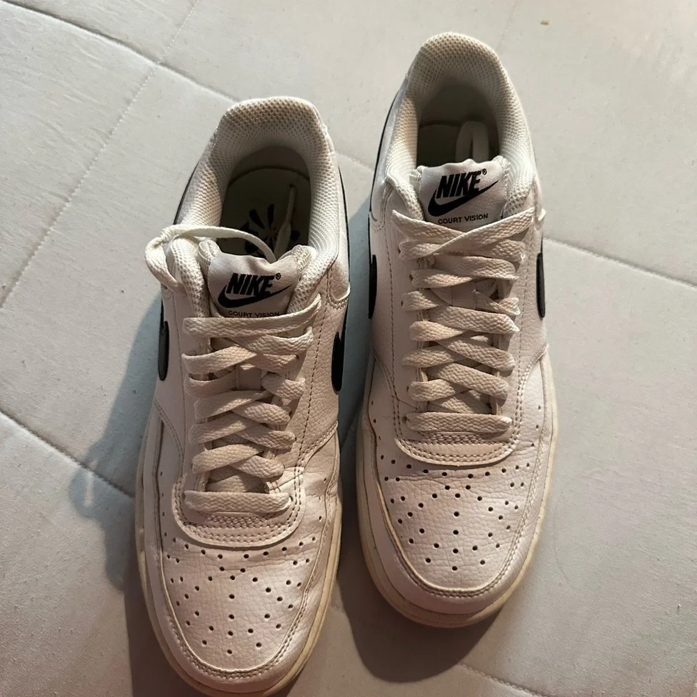 Nike Cream and Black Low-Top Sneakers